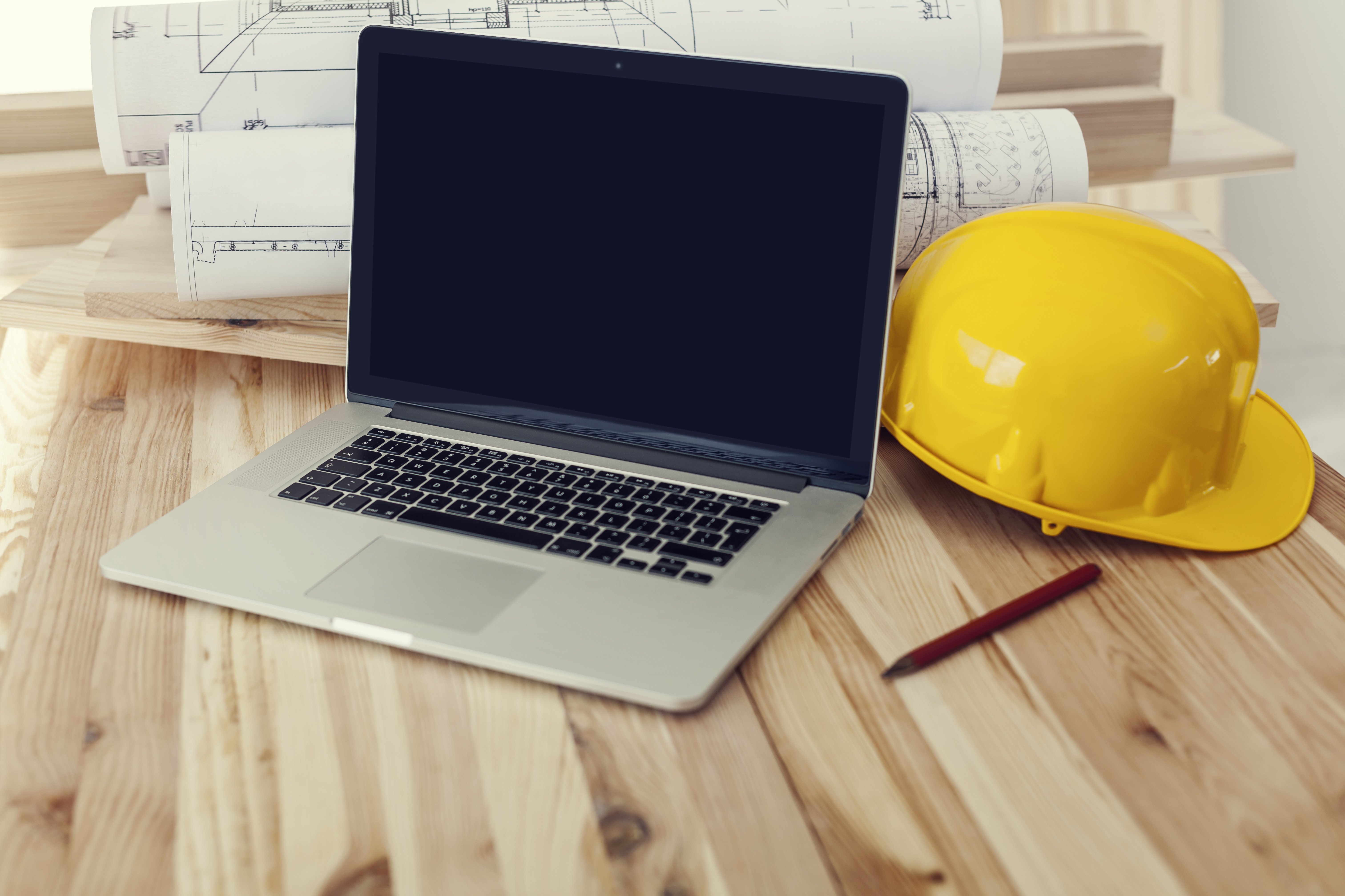 ri/close-up-laptop-workplace-construction-worker.jpg